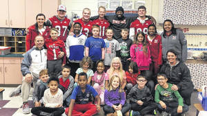 Student-athletes, coaches participate in American Education Week
